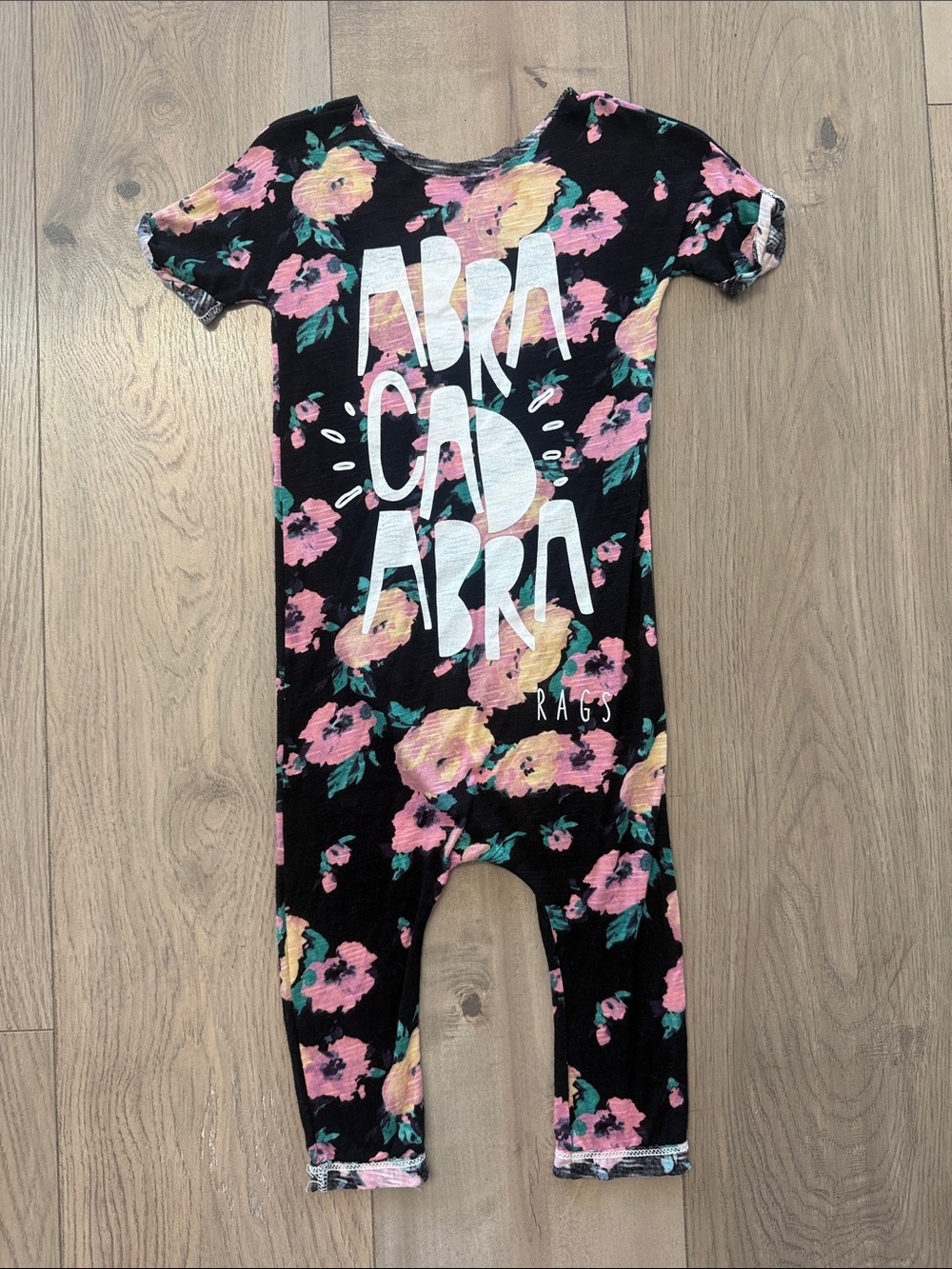 OG raw neck Rags to Raches Black Floral Romper